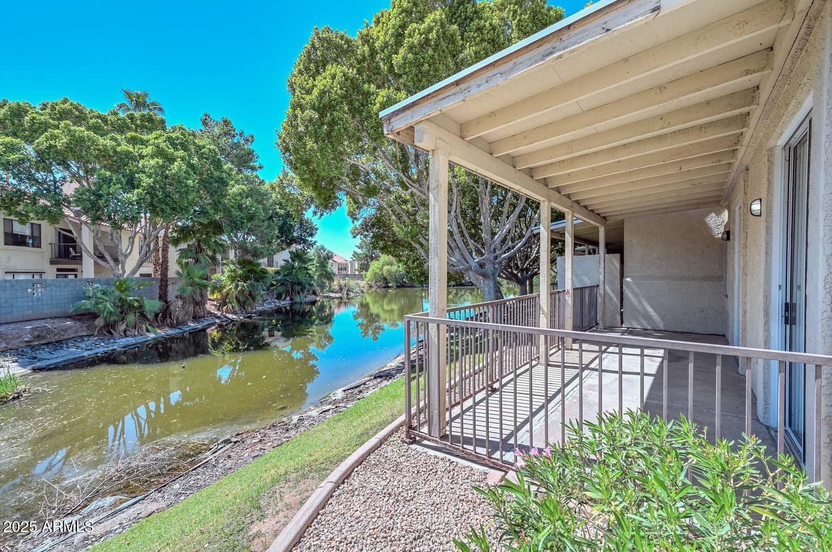 7101 West Beardsley Road, Unit 1104 Glendale, AZ 85308 - Photo 32 of 40 a view of a house with backyard and sitting area