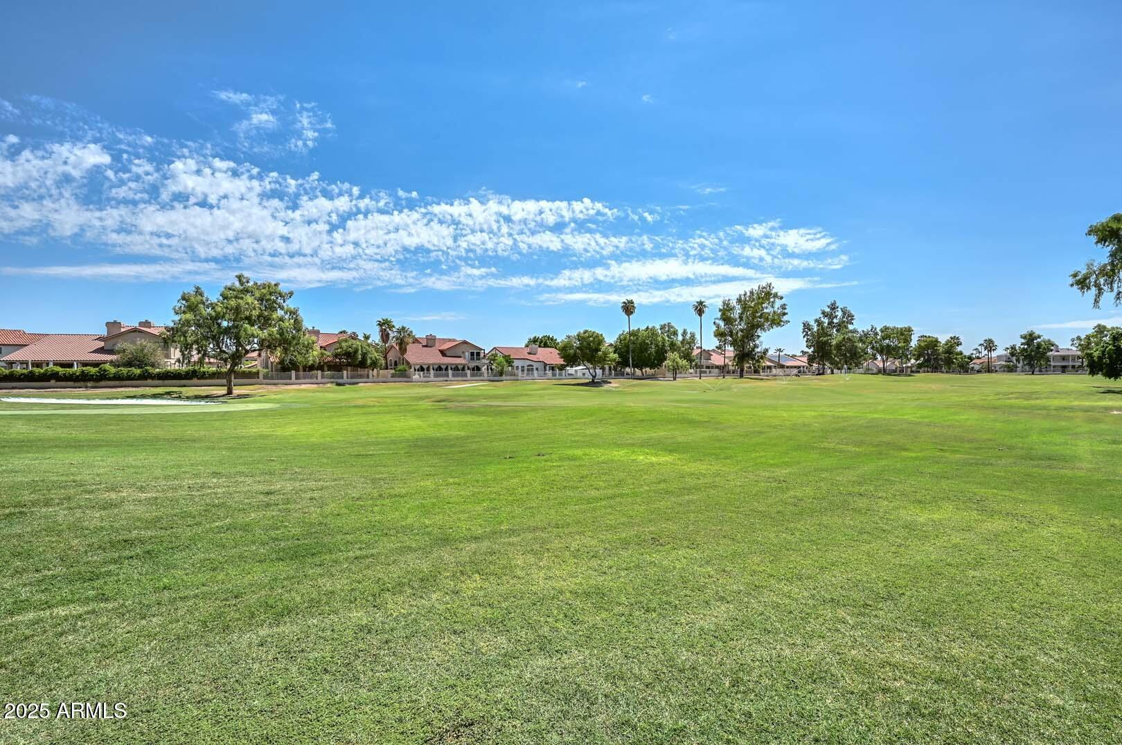 7101 West Beardsley Road, Unit 1104 Glendale, AZ 85308 - Photo 34 of 40 a view of a big yard with an outdoor space and seating
