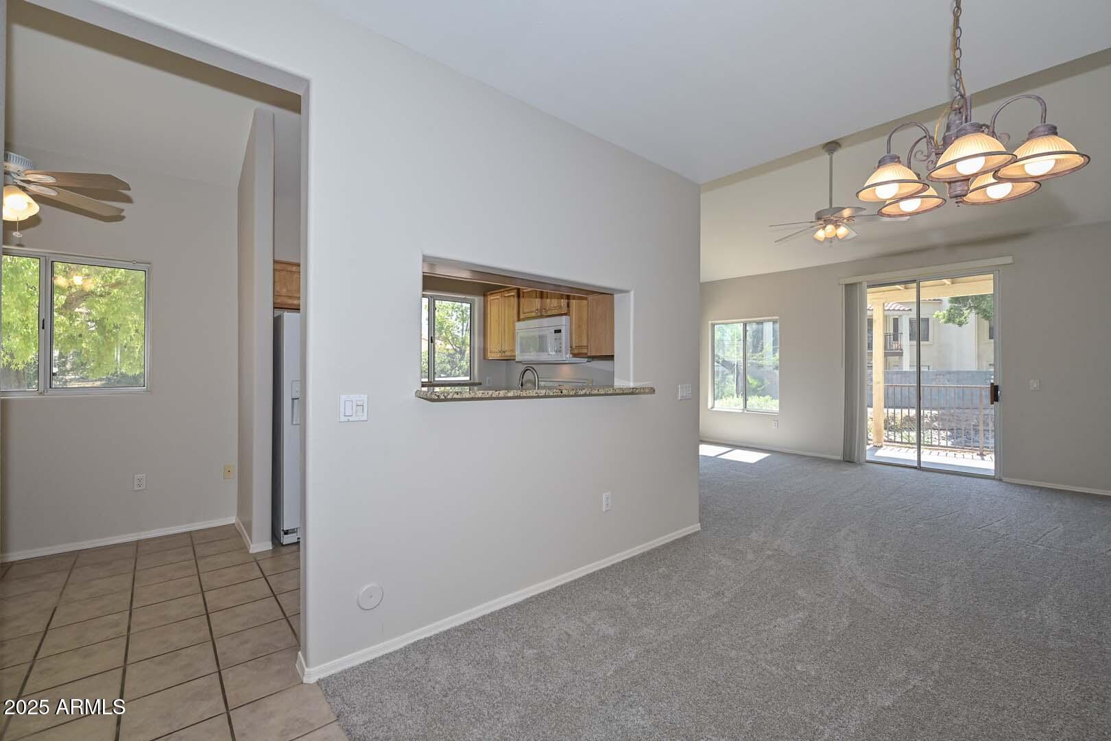 7101 West Beardsley Road, Unit 1104 Glendale, AZ 85308 - Photo 9 of 40 a view of an empty room with a window