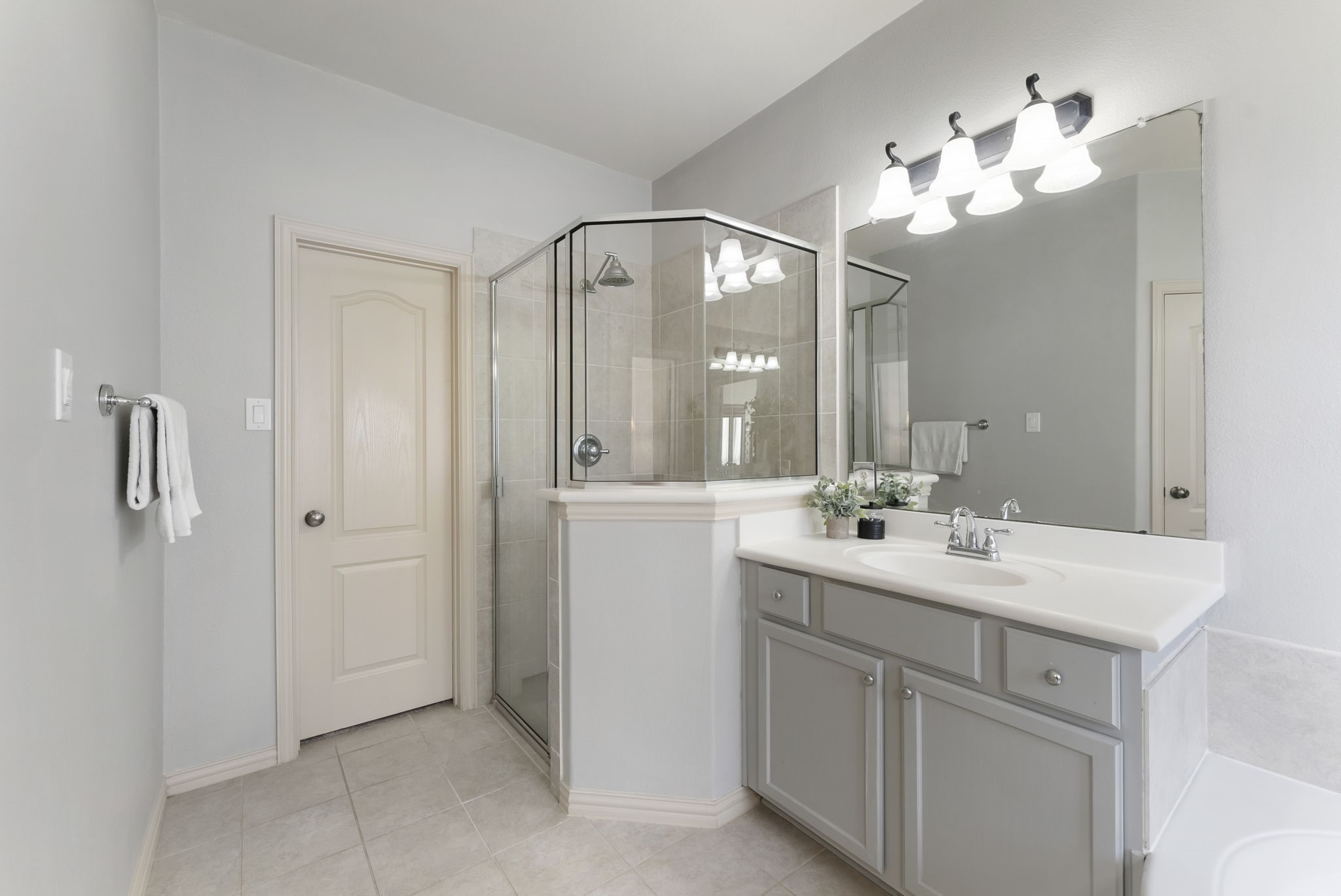 27515 Chris Ridge Court Spring, TX 77386 - Photo 16 of 31 Another view of the primary bath with the walk in shower. Just through this door is the large primary closet.