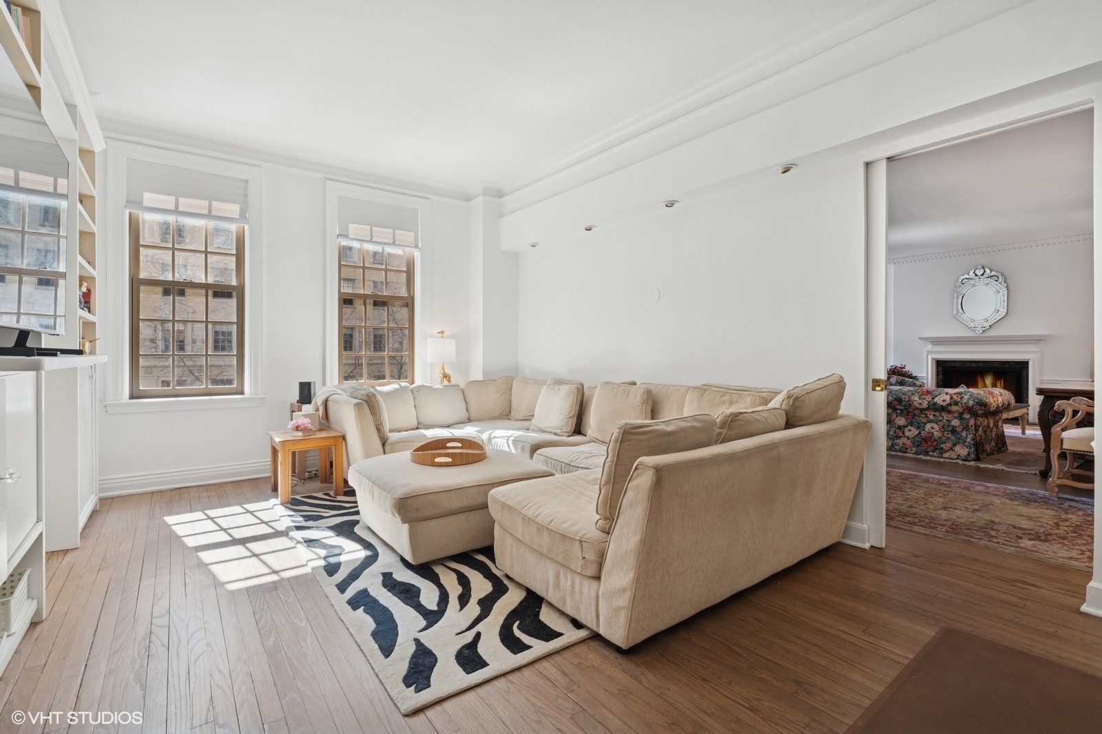 232 East Walton Place, Unit 4E Chicago, IL 60611 - Photo 19 of 32 a living room with furniture and a wooden floor