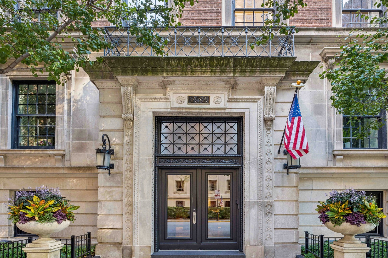 232 East Walton Place, Unit 4E Chicago, IL 60611 - Photo 2 of 32 a front view of a building with outdoor space