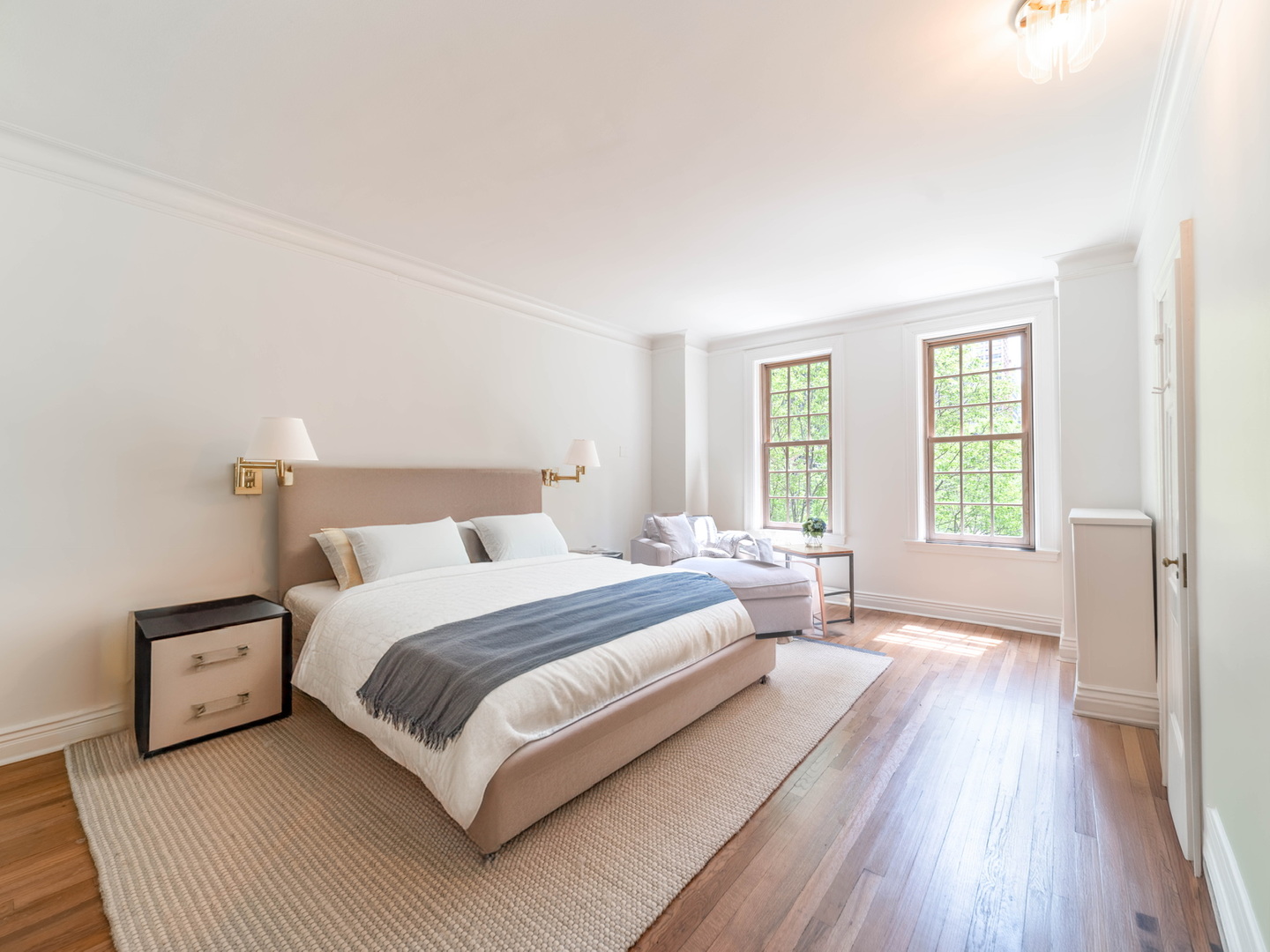 232 East Walton Place, Unit 4E Chicago, IL 60611 - Photo 23 of 32 a spacious bedroom with a bed and a large window