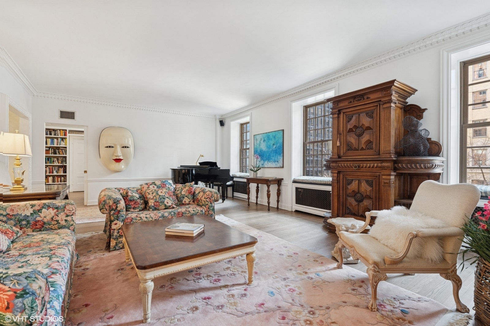 232 East Walton Place, Unit 4E Chicago, IL 60611 - Photo 9 of 32 a living room with furniture a fireplace and a flat screen tv