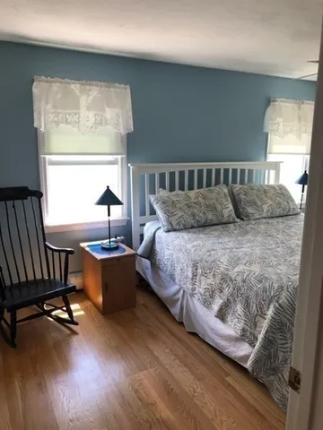 a kitchen with sink refrigerator and window