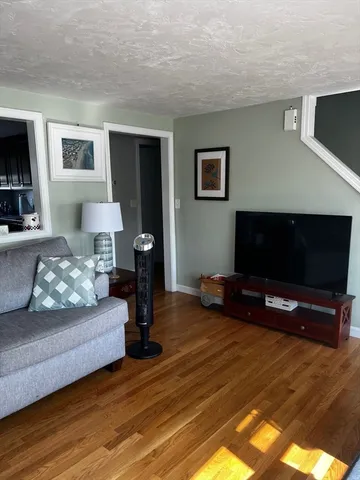 a kitchen with a refrigerator a stove top oven a sink and dishwasher
