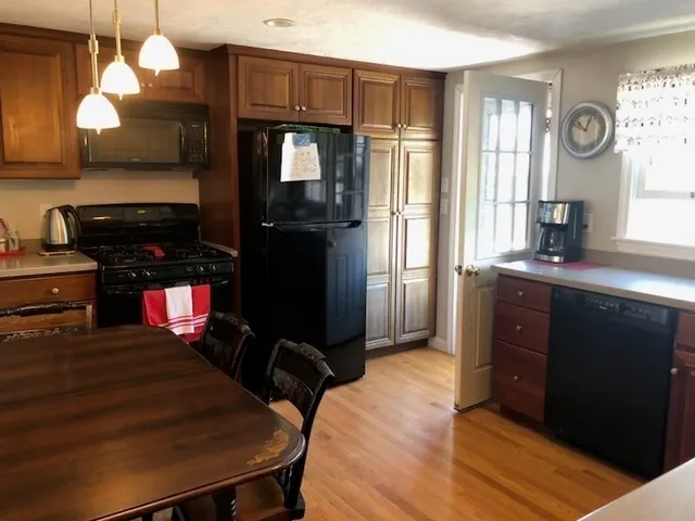 a bedroom with a bed and a table in it