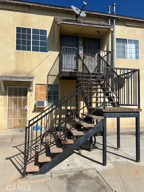 a view of a balcony with chairs