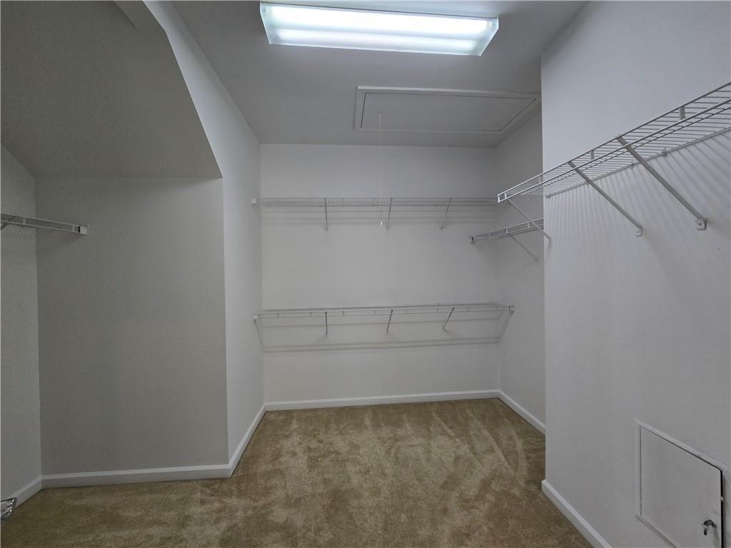 624 Maple Grove Way Marietta, GA 30066 - Photo 19 of 27 a view of a room with empty racks