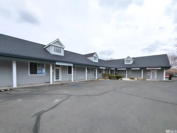 front view of a house with a street