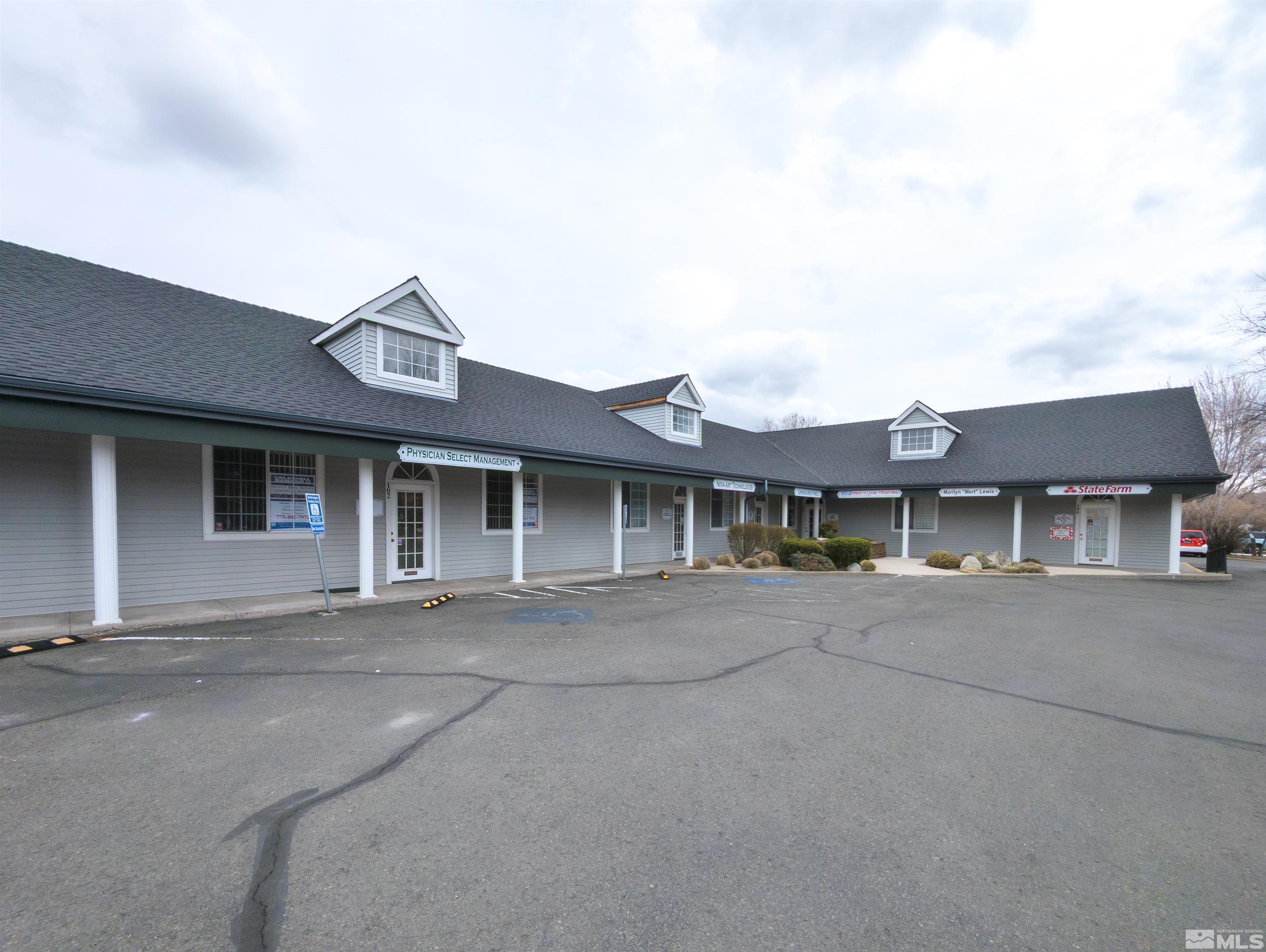 front view of a house with a street