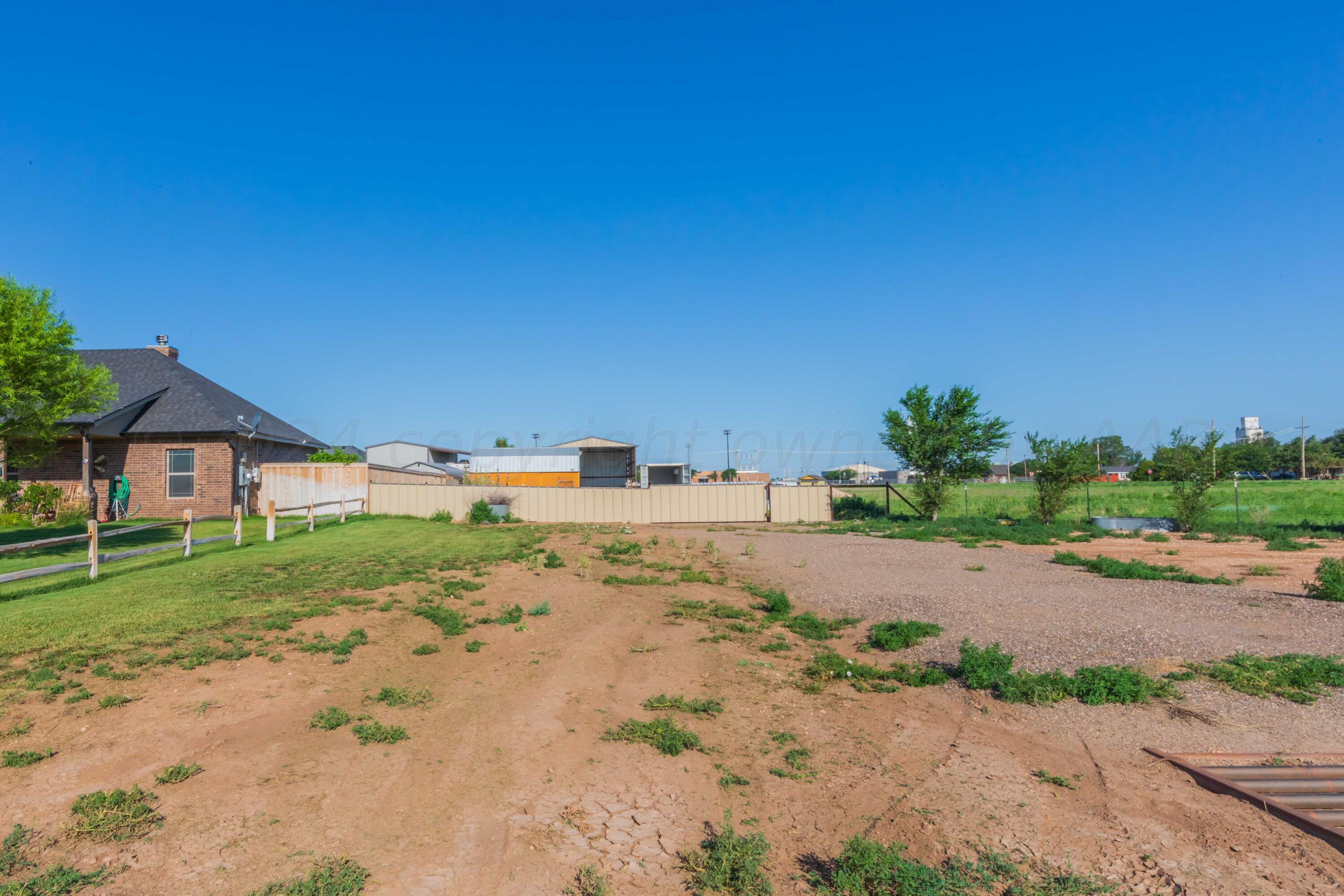 2450 Blue Springs Amarillo, TX 79124 - Photo 48 of 51 a view of a dirt road and a building