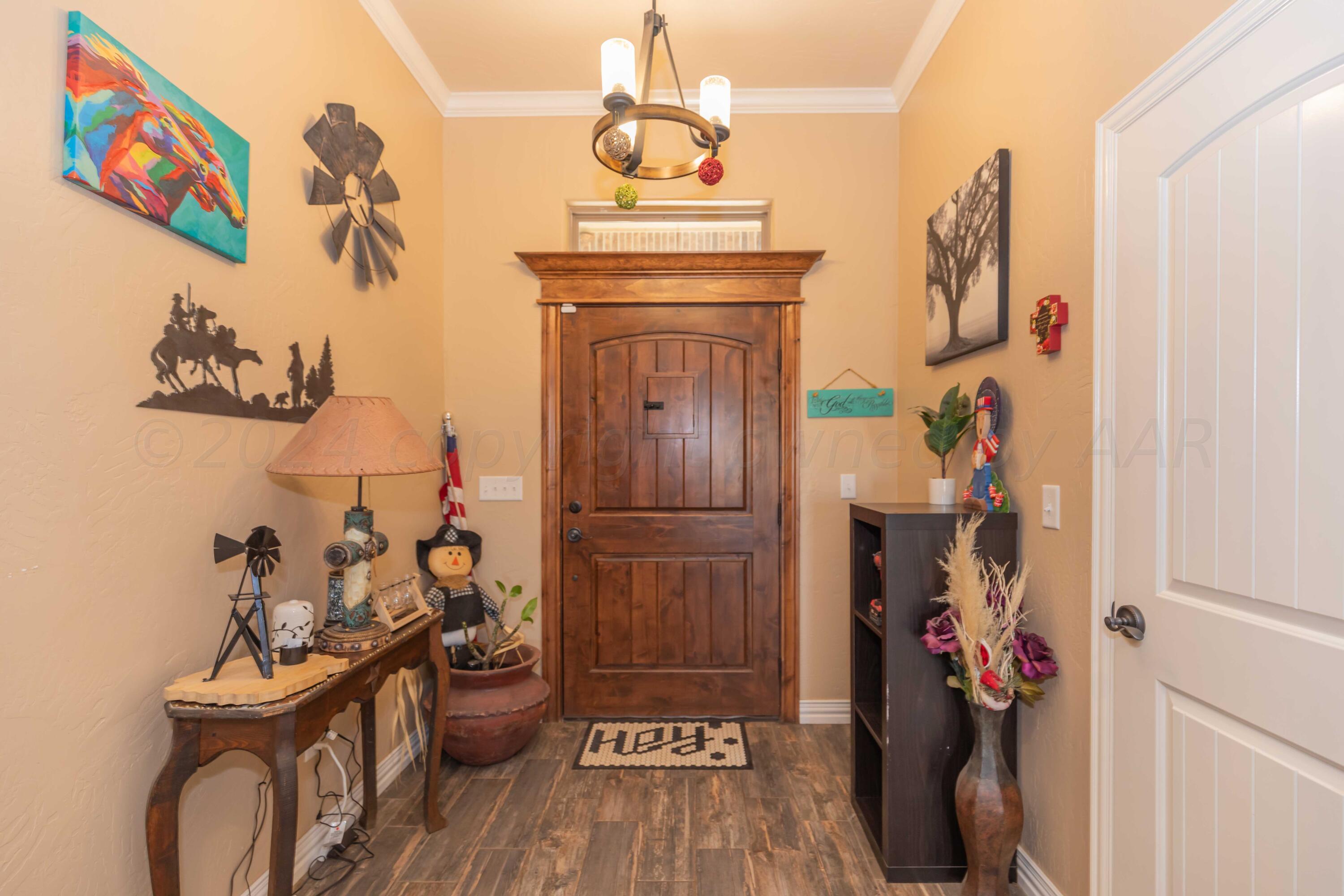 2450 Blue Springs Amarillo, TX 79124 - Photo 5 of 51 a view of a entryway and storage
