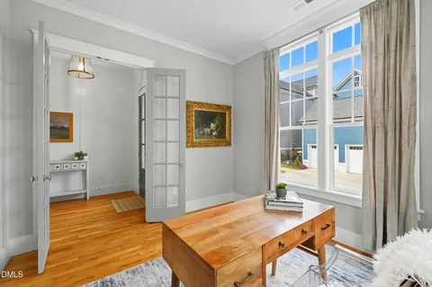 a view of a livingroom with furniture and wooden floor