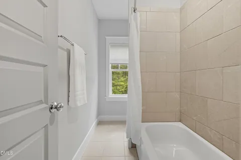 a bathroom with a bathtub
