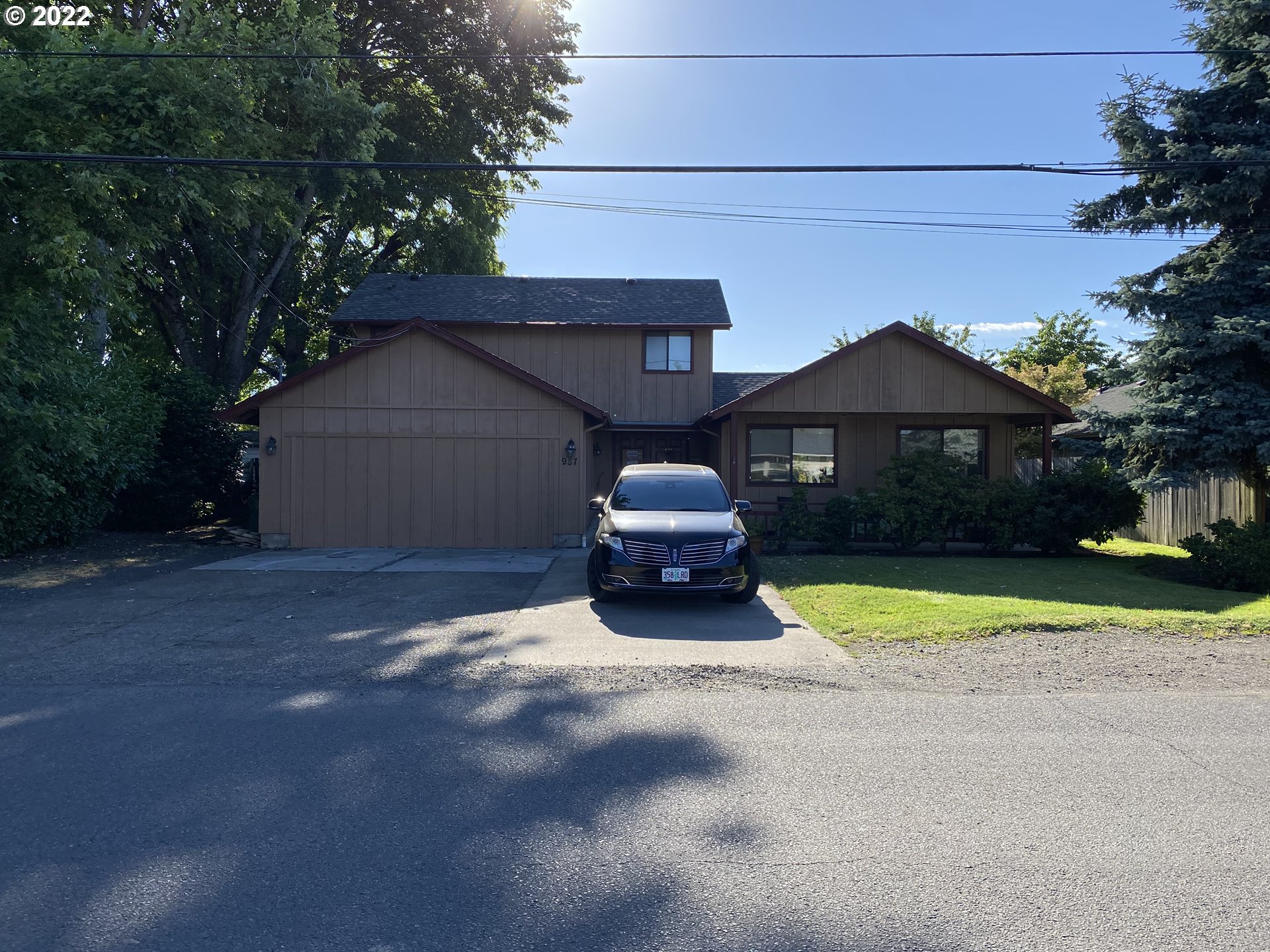 a house view with a garden space