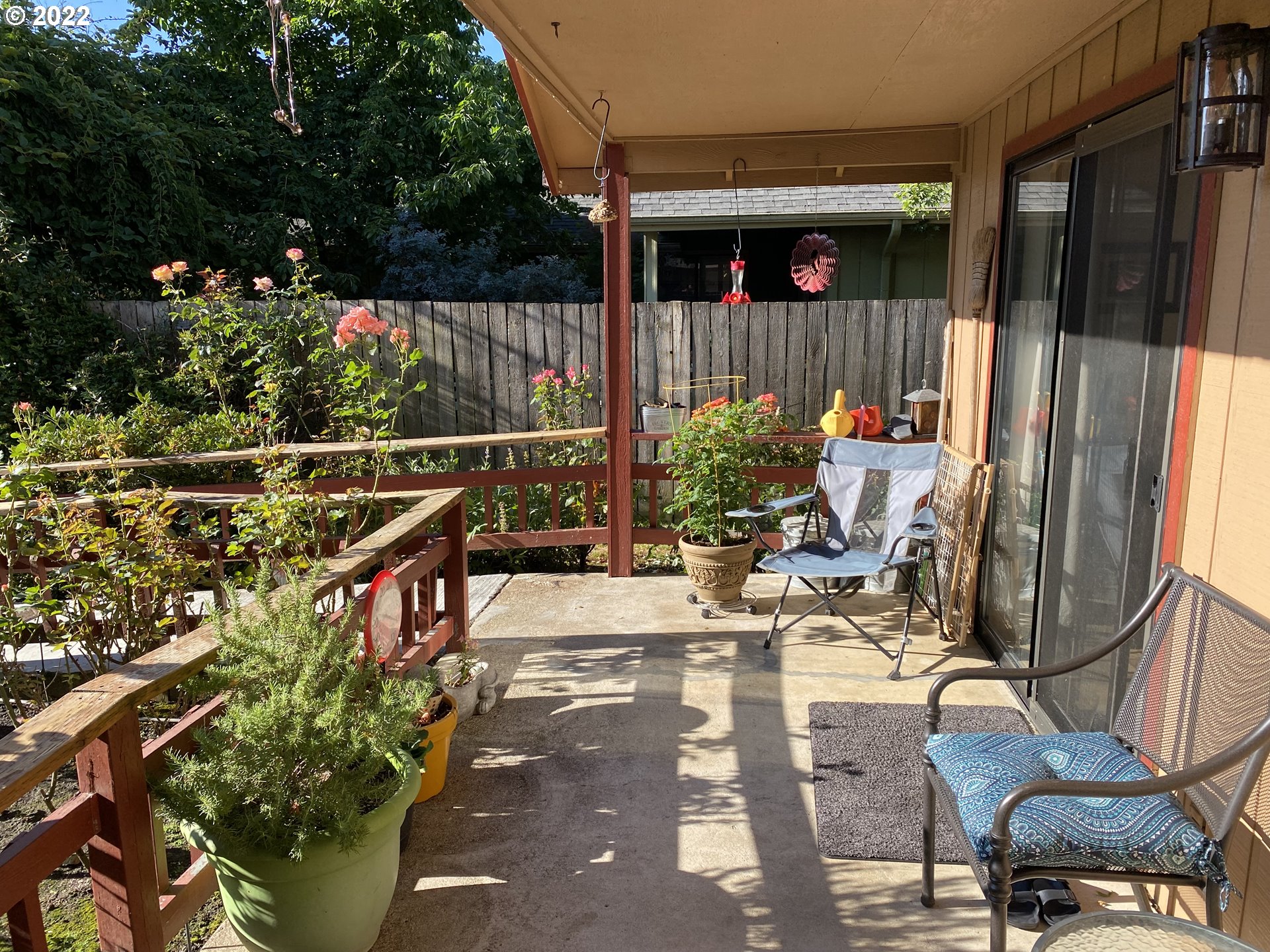 987 Arcadia Drive Eugene, OR 97401 - Photo 19 of 29 a view of a chairs and tables in the back yard of the house