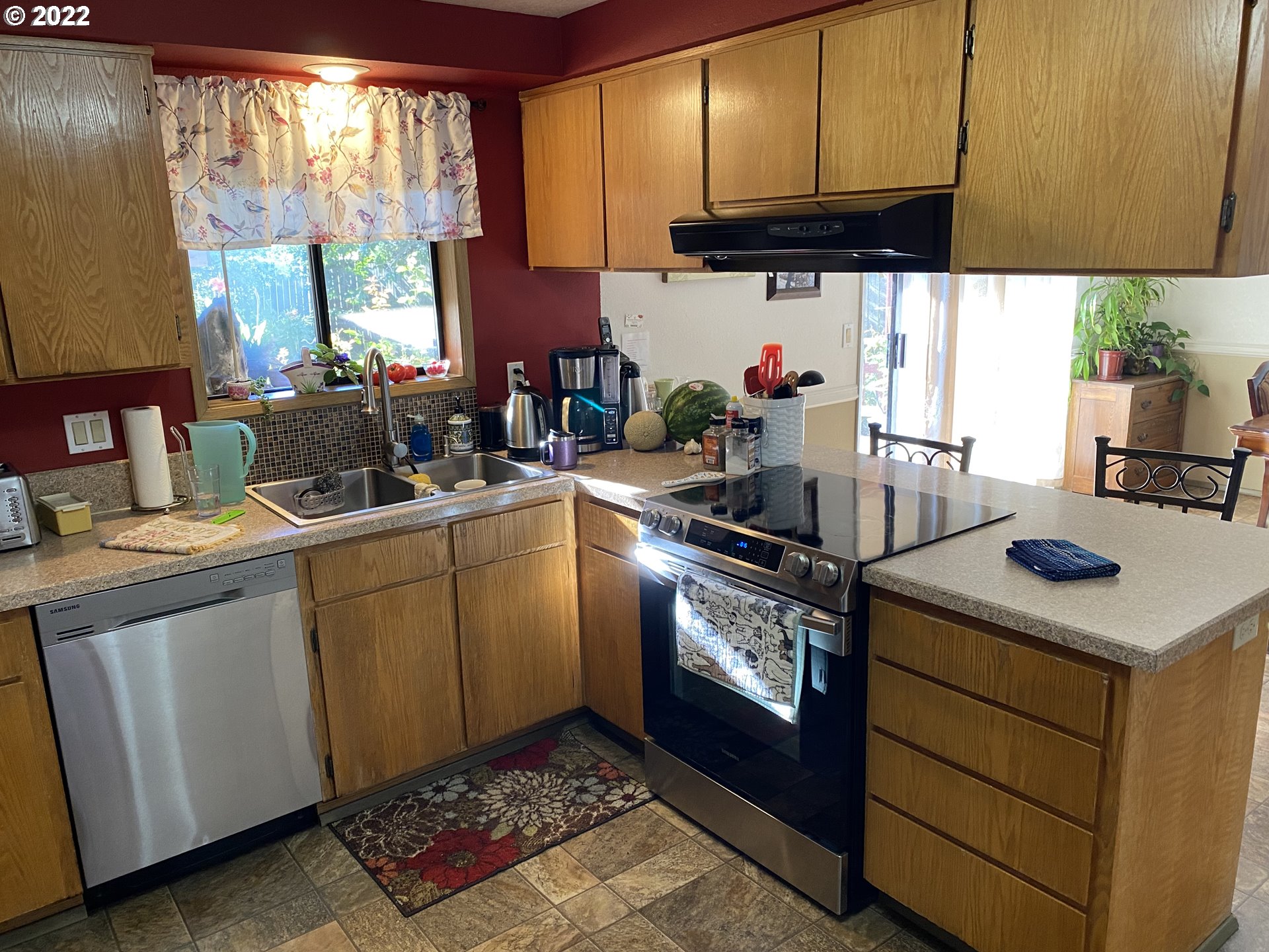 987 Arcadia Drive Eugene, OR 97401 - Photo 9 of 29 a kitchen with a sink cabinets and window