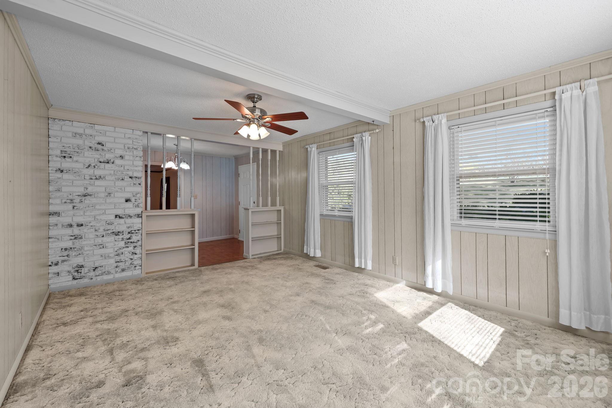 945 Alvin Hough Road Midland, NC 28107 - Photo 11 of 27 a view of a livingroom with a chandelier