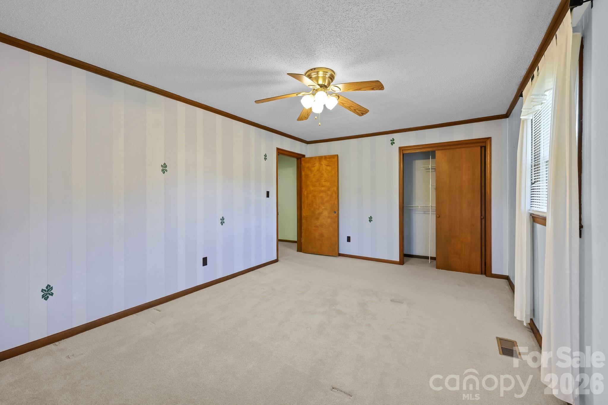 945 Alvin Hough Road Midland, NC 28107 - Photo 17 of 27 a view of an empty room with a window
