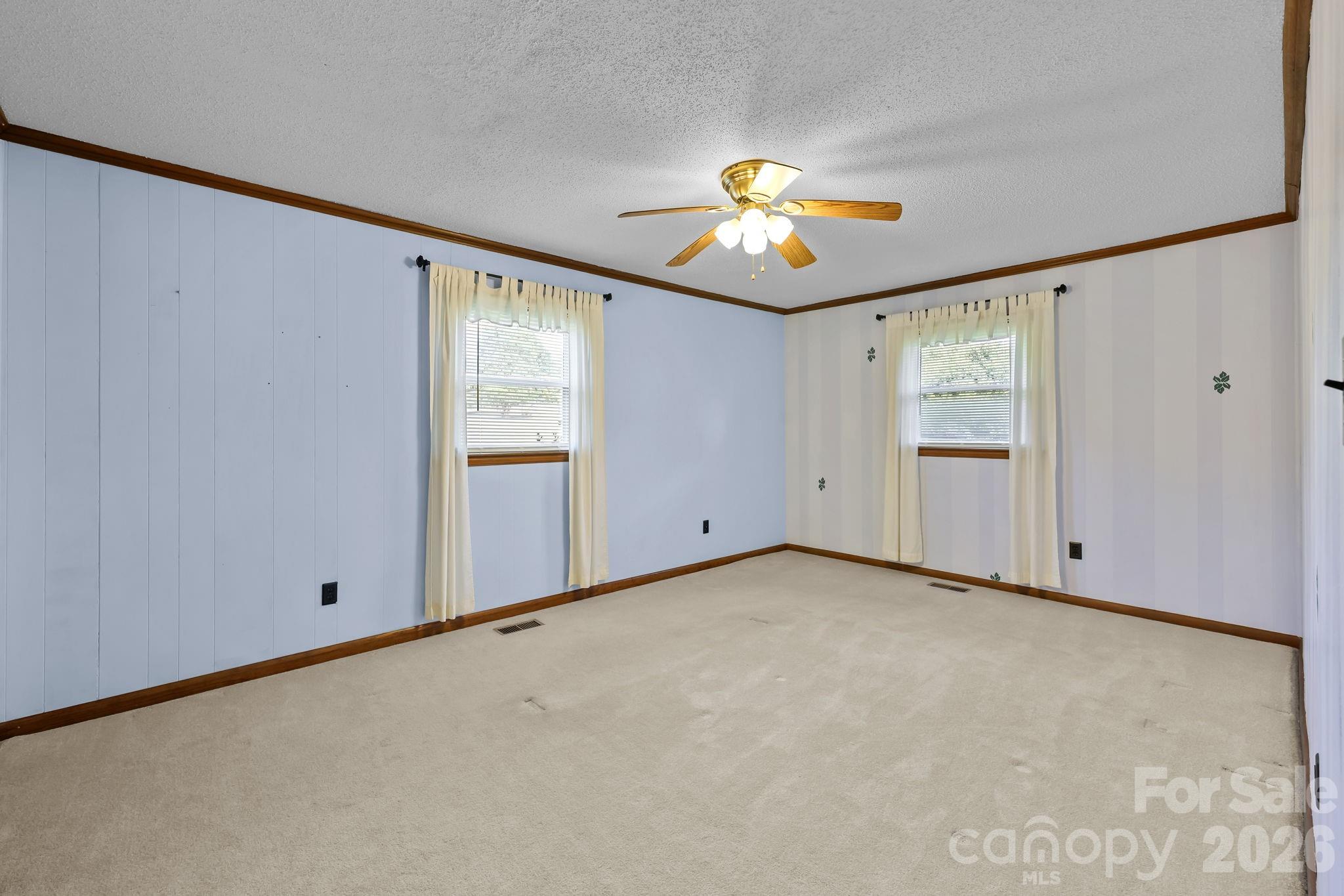 945 Alvin Hough Road Midland, NC 28107 - Photo 18 of 27 a view of an empty room with a window