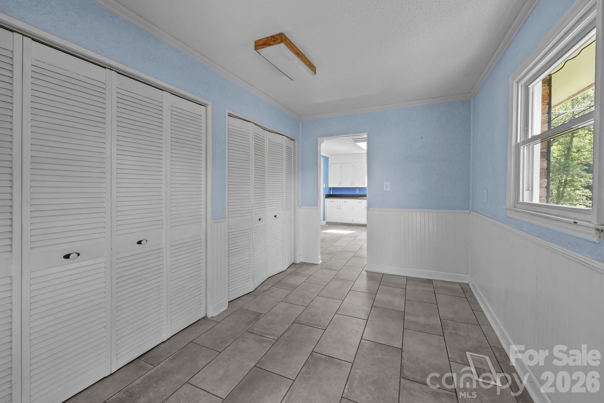 945 Alvin Hough Road Midland, NC 28107 - Photo 22 of 27 a view of a room with a chandeliers