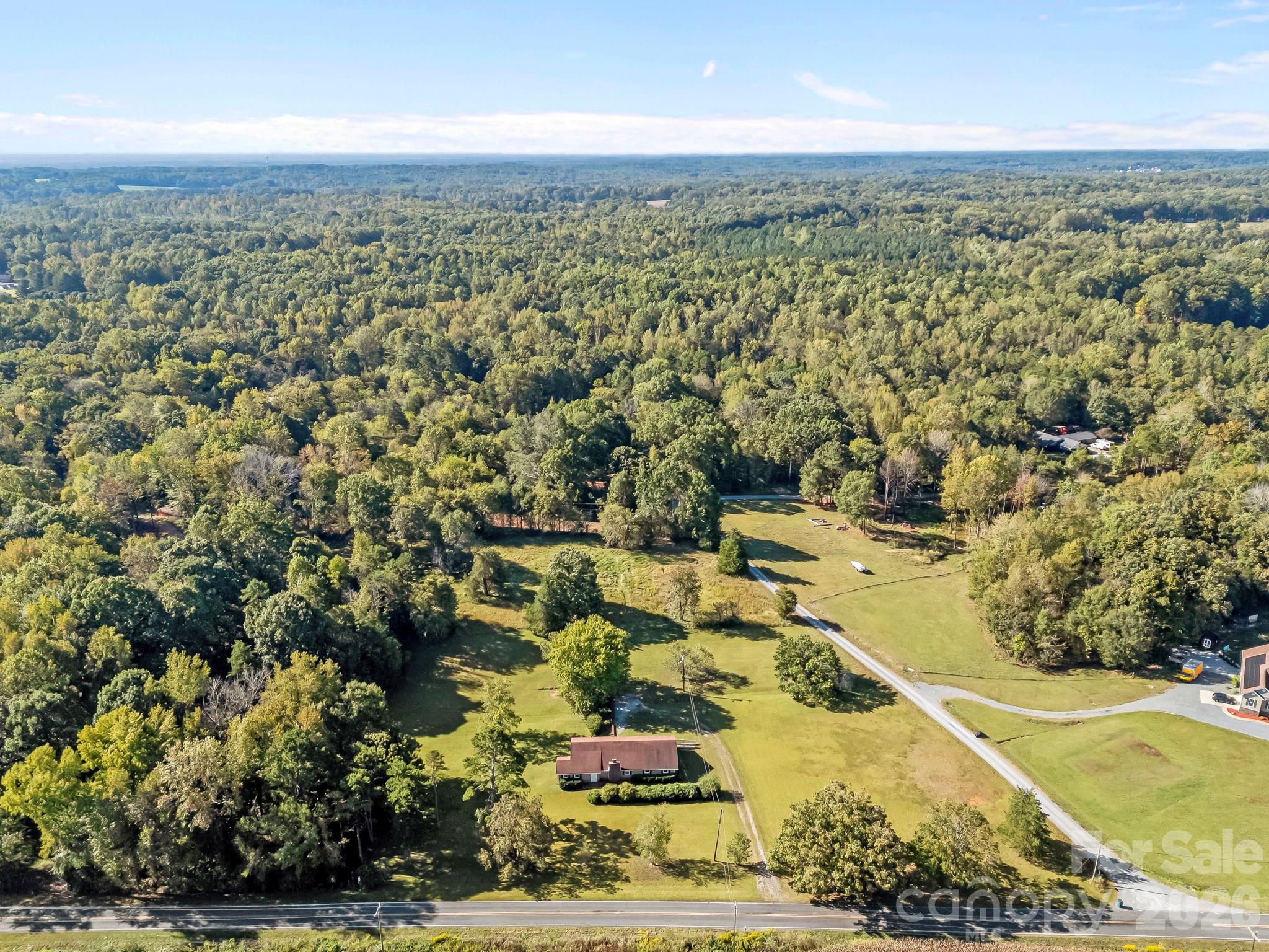 945 Alvin Hough Road Midland, NC 28107 - Photo 27 of 27 an aerial view of residential houses with outdoor space