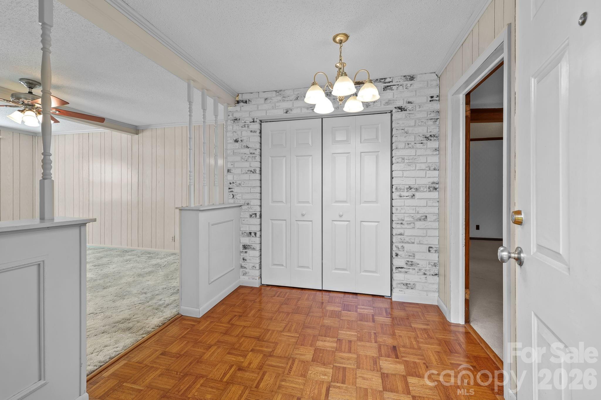 945 Alvin Hough Road Midland, NC 28107 - Photo 9 of 27 wooden floor in an empty room with a bathroom