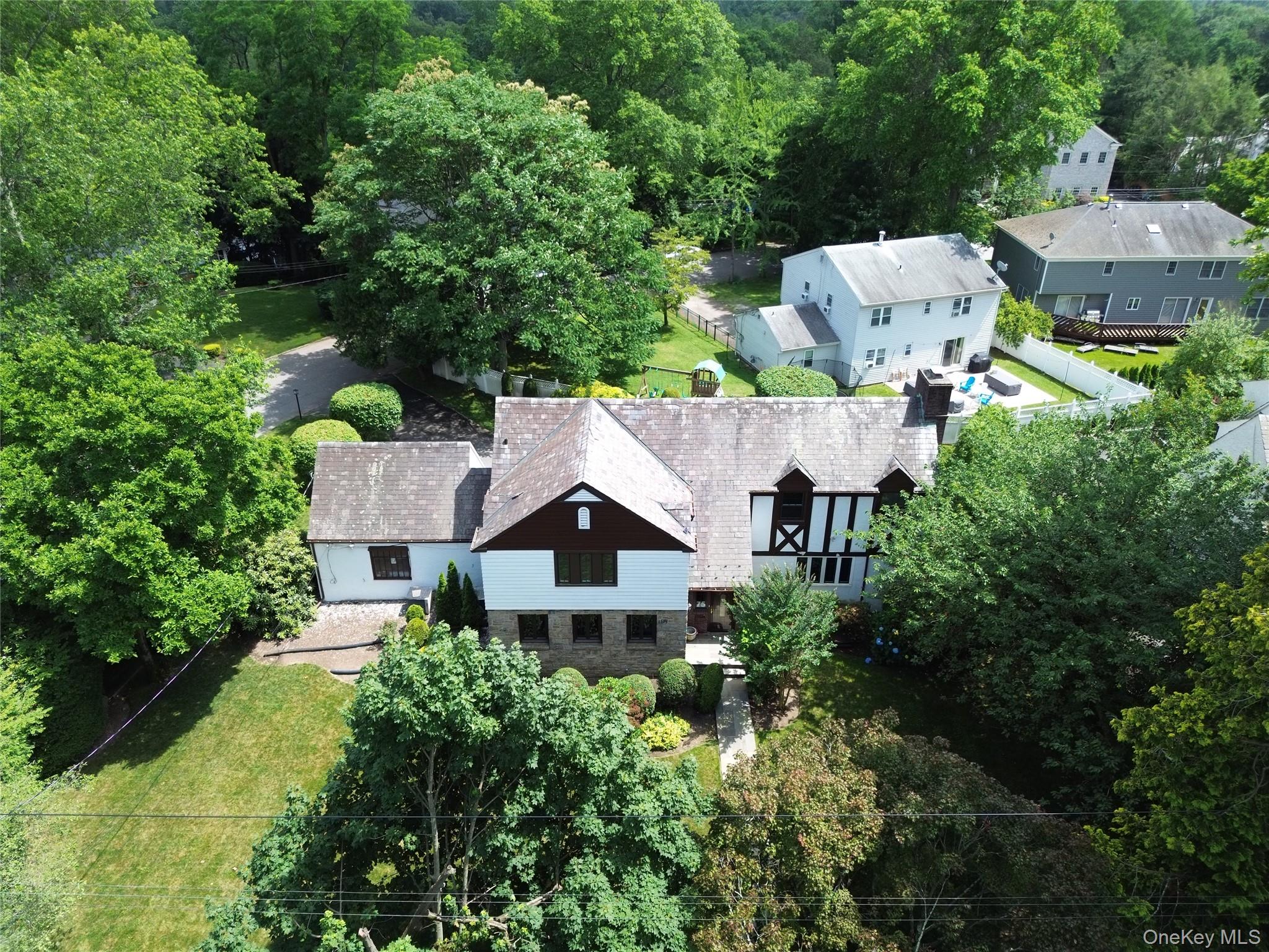 75 Lord Kitchener Road New Rochelle, NY 10804 - Photo 41 of 47 an aerial view of a house with a garden