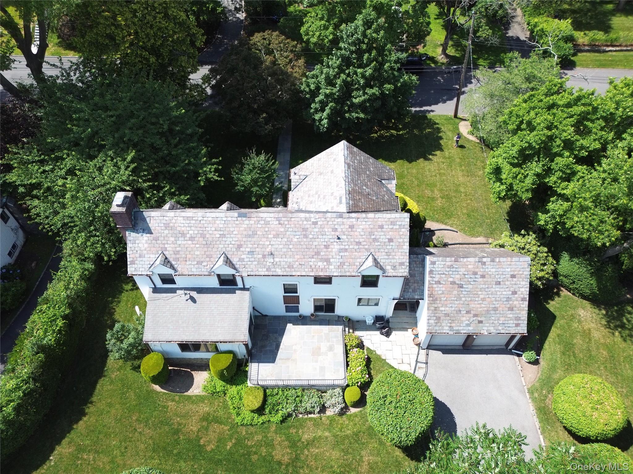 75 Lord Kitchener Road New Rochelle, NY 10804 - Photo 44 of 47 an aerial view of a house with garden space and street view