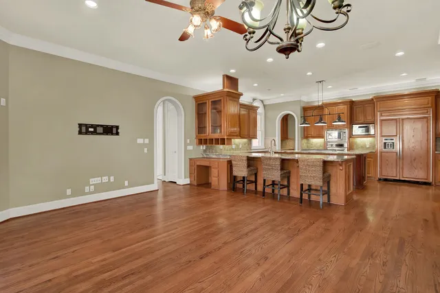 a view of kitchen and dining room with wooden floor