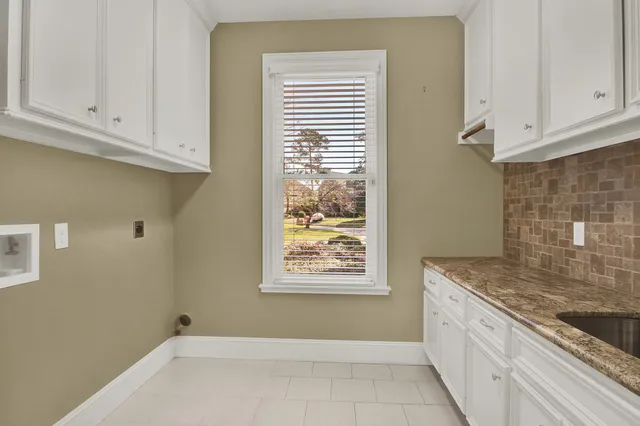 a view of cabinets and window