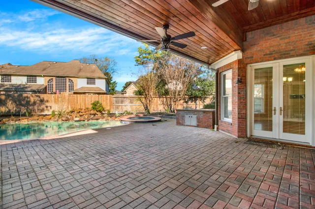 a view of a swimming pool with an outdoor space