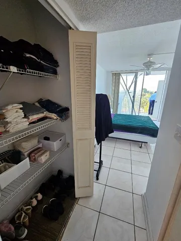 a kitchen with a stove and a refrigerator