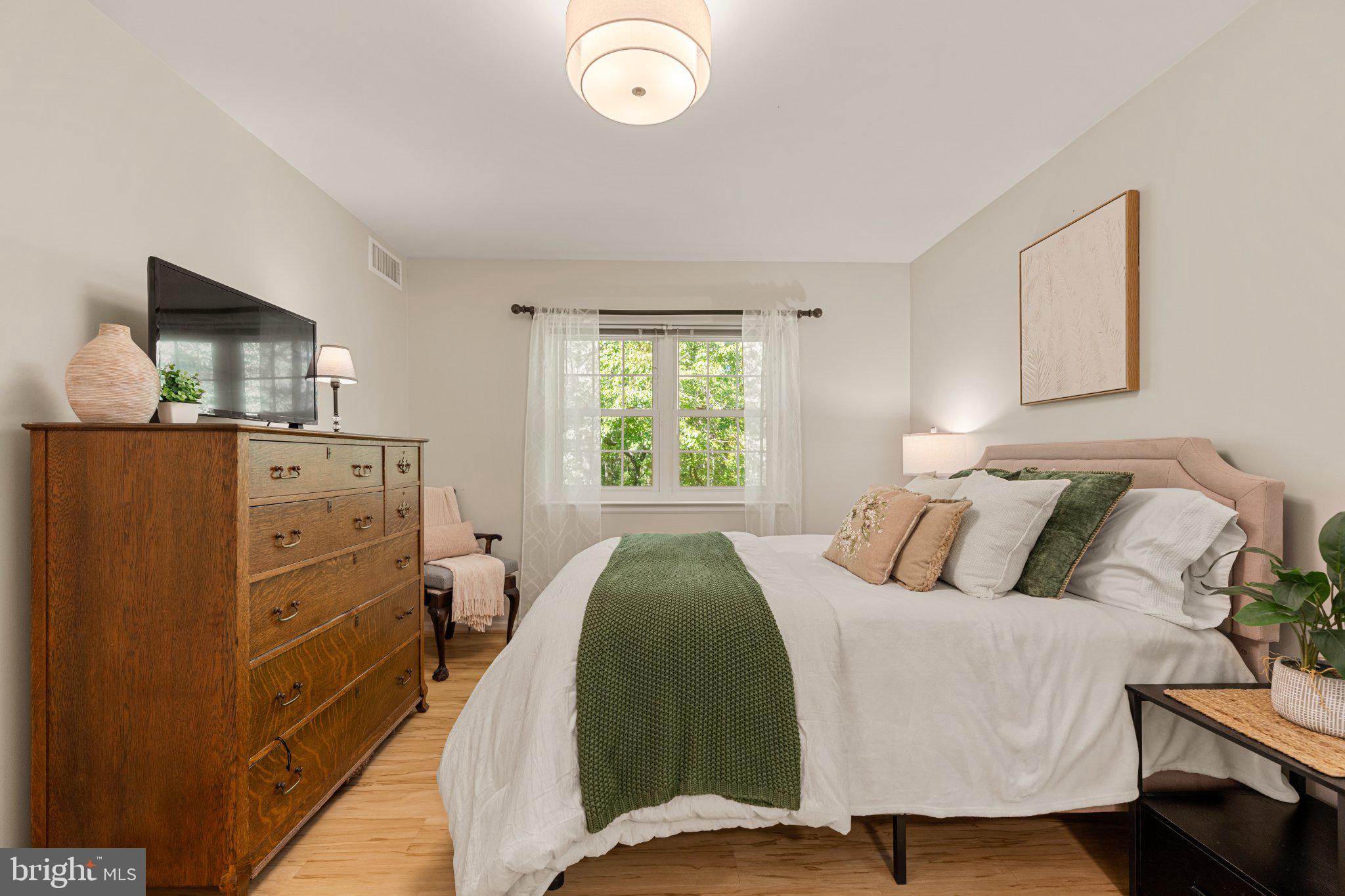 5809 Cove Landing Road, Unit 303 Burke, VA 22015 - Photo 13 of 27 Primary Bedroom Suite