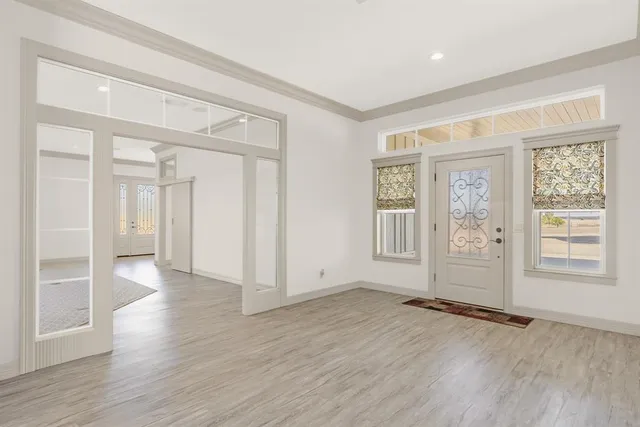 a view of an empty room with a window