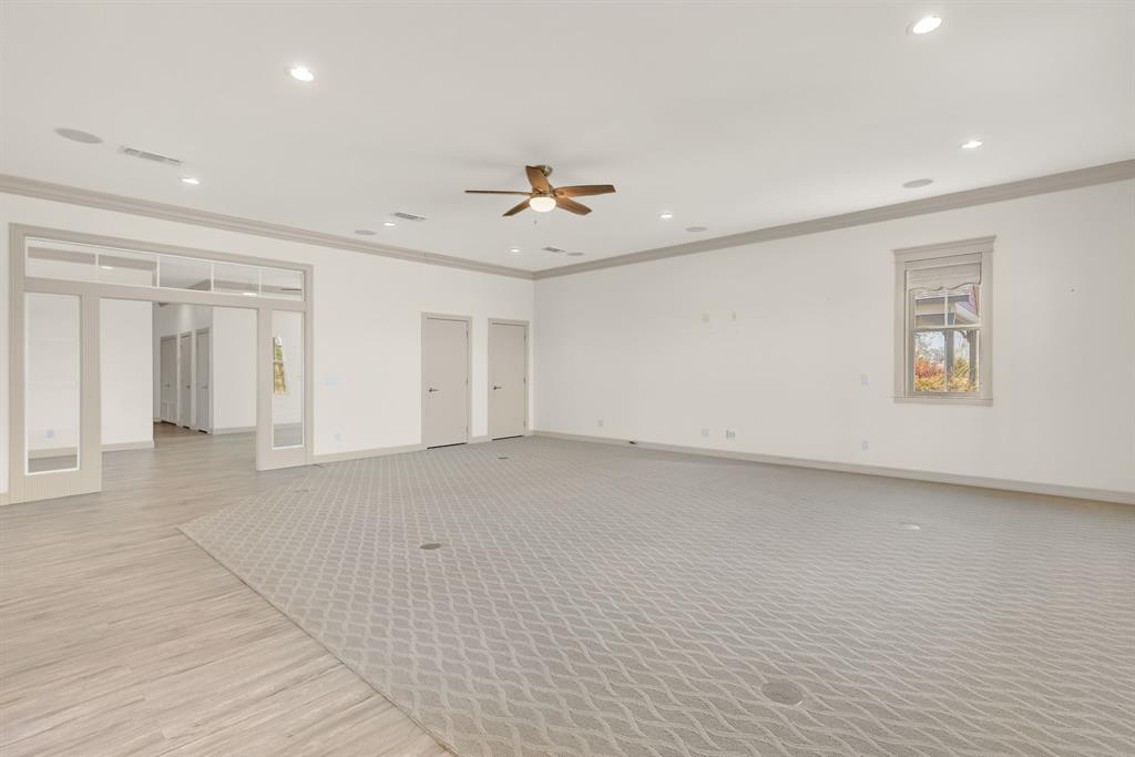 2263 County Road 33040, Unit 4 Brookston, TX 75421 - Photo 17 of 38 wooden floor in an empty room with a window