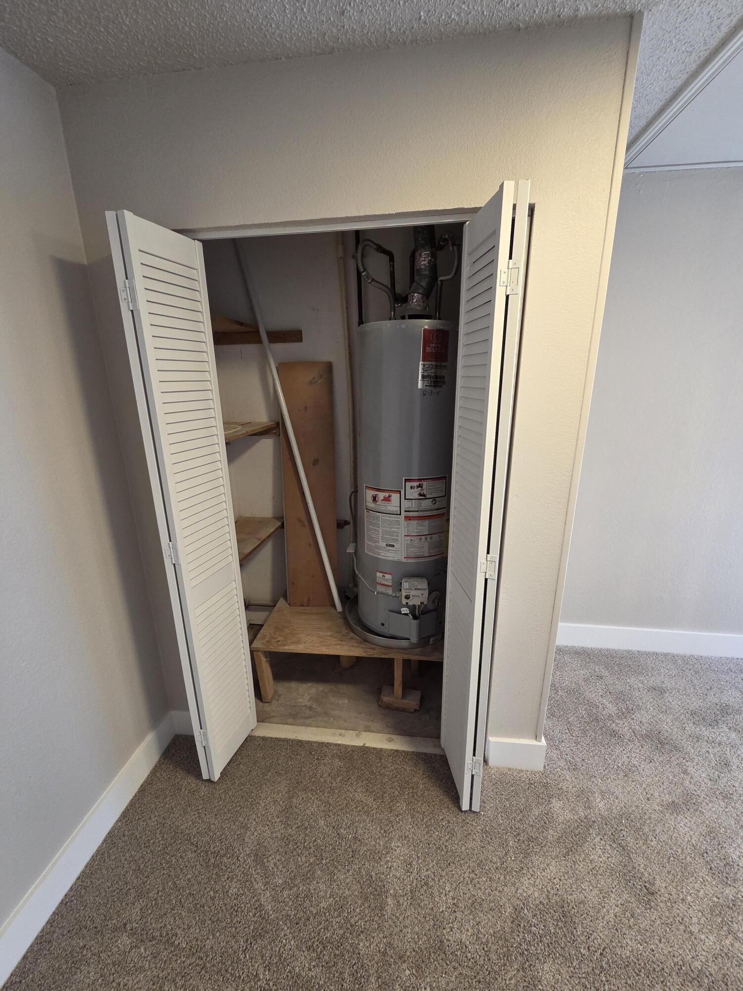 5224 73rd Street Lubbock, TX 79424 - Photo 13 of 18 Bedroom 4 water heater
