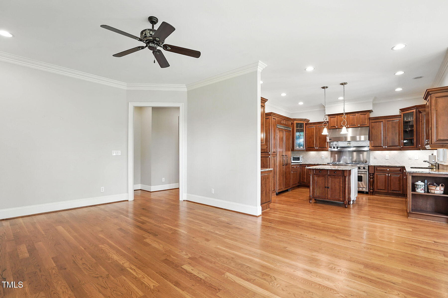 1605 Hunting Ridge Road Raleigh, NC 27615 - Photo 16 of 55 a view of kitchen with kitchen island stainless steel appliances refrigerator stove and oven