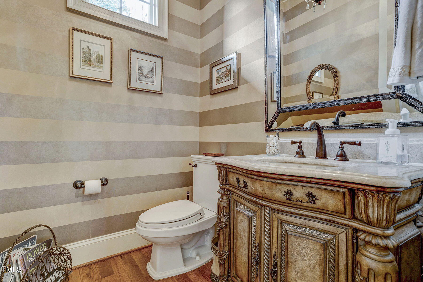 1605 Hunting Ridge Road Raleigh, NC 27615 - Photo 21 of 55 a bathroom with a toilet a sink and a bathtub