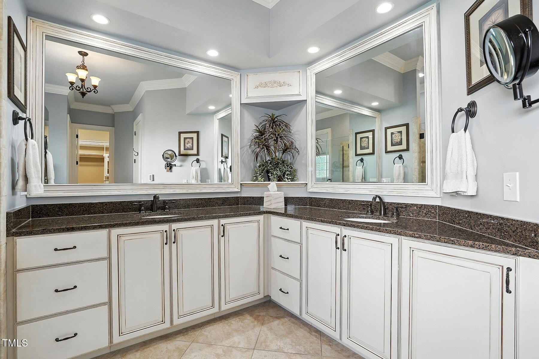 1605 Hunting Ridge Road Raleigh, NC 27615 - Photo 26 of 55 a bathroom with a granite countertop sink and a mirror