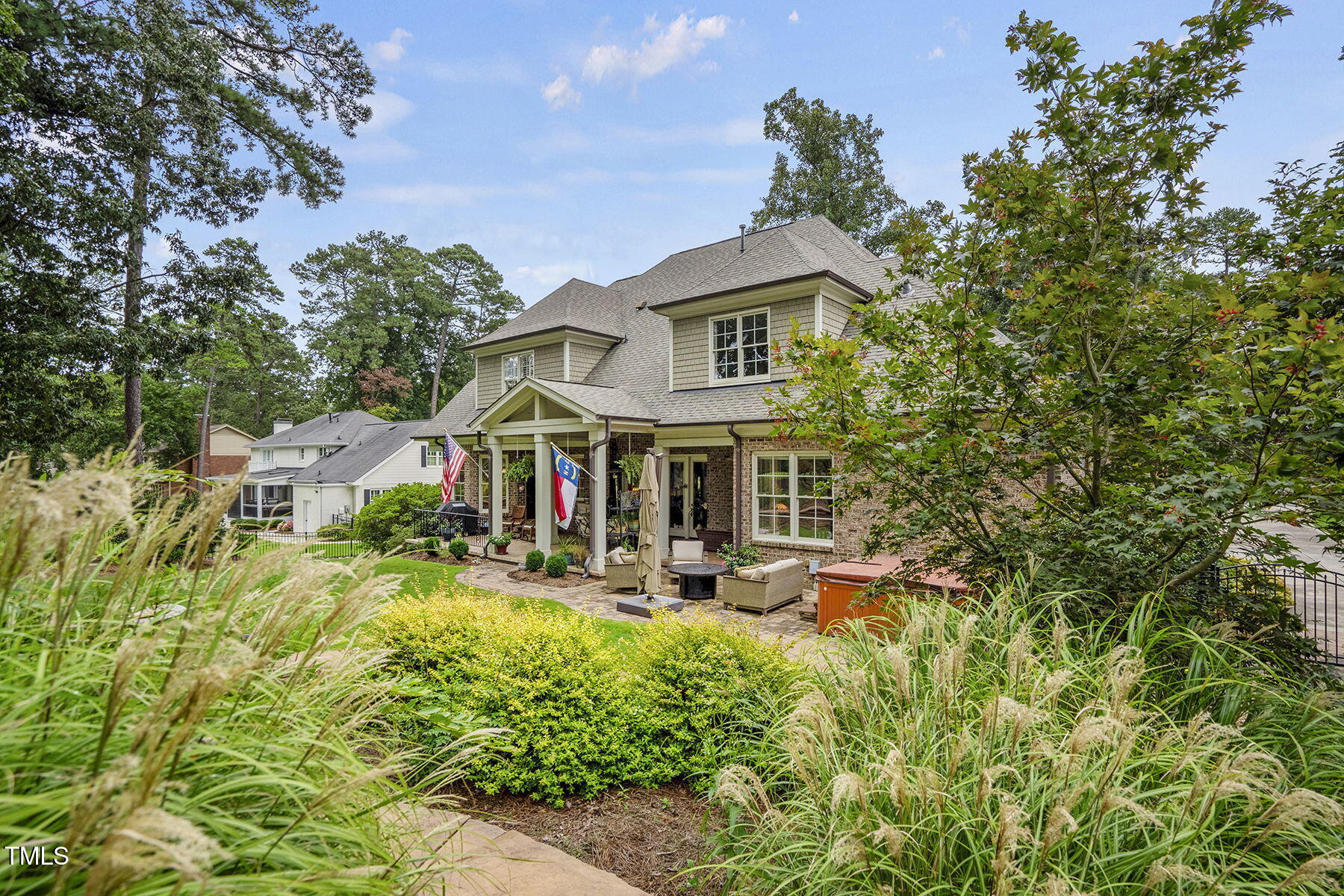 1605 Hunting Ridge Road Raleigh, NC 27615 - Photo 43 of 55 a front view of a house with swimming pool and sitting area