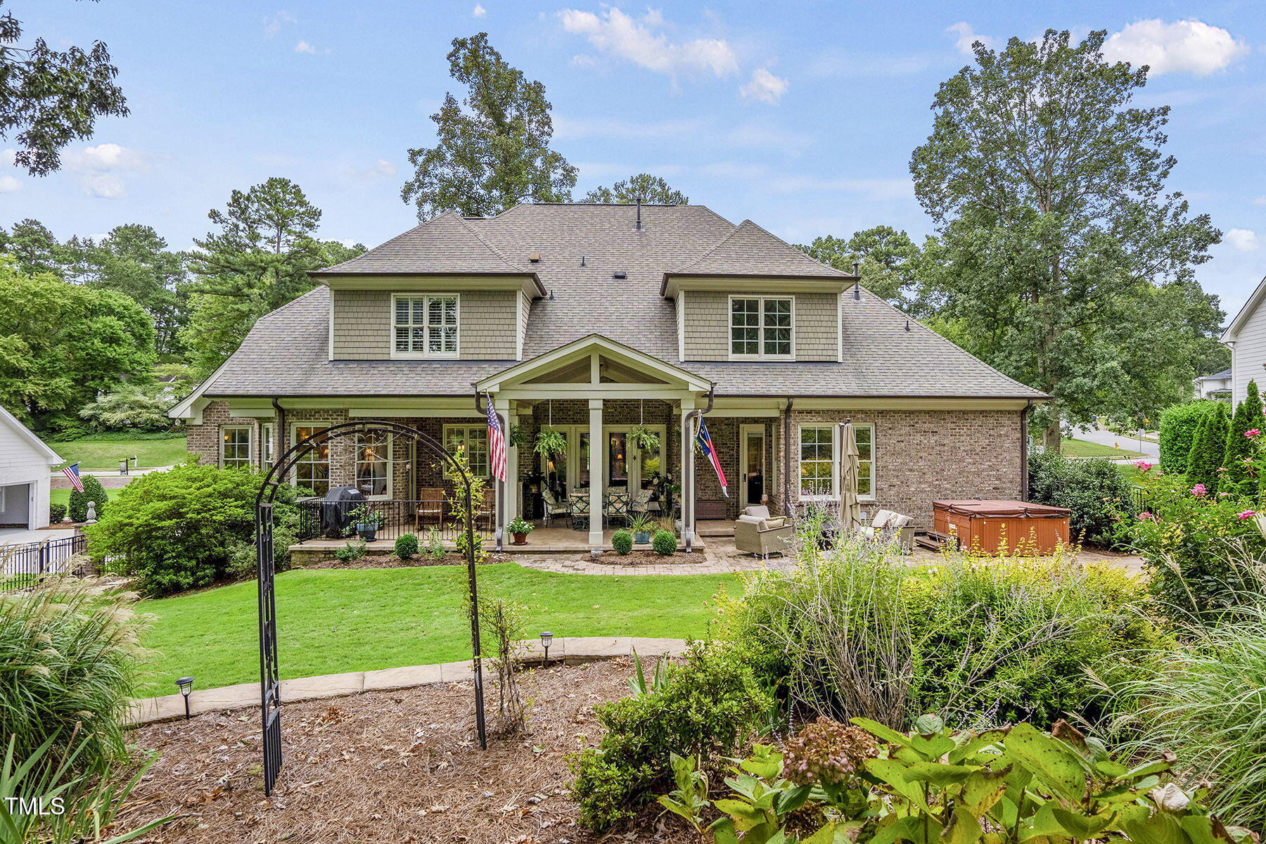 1605 Hunting Ridge Road Raleigh, NC 27615 - Photo 45 of 55 a view of a house with a yard and sitting area