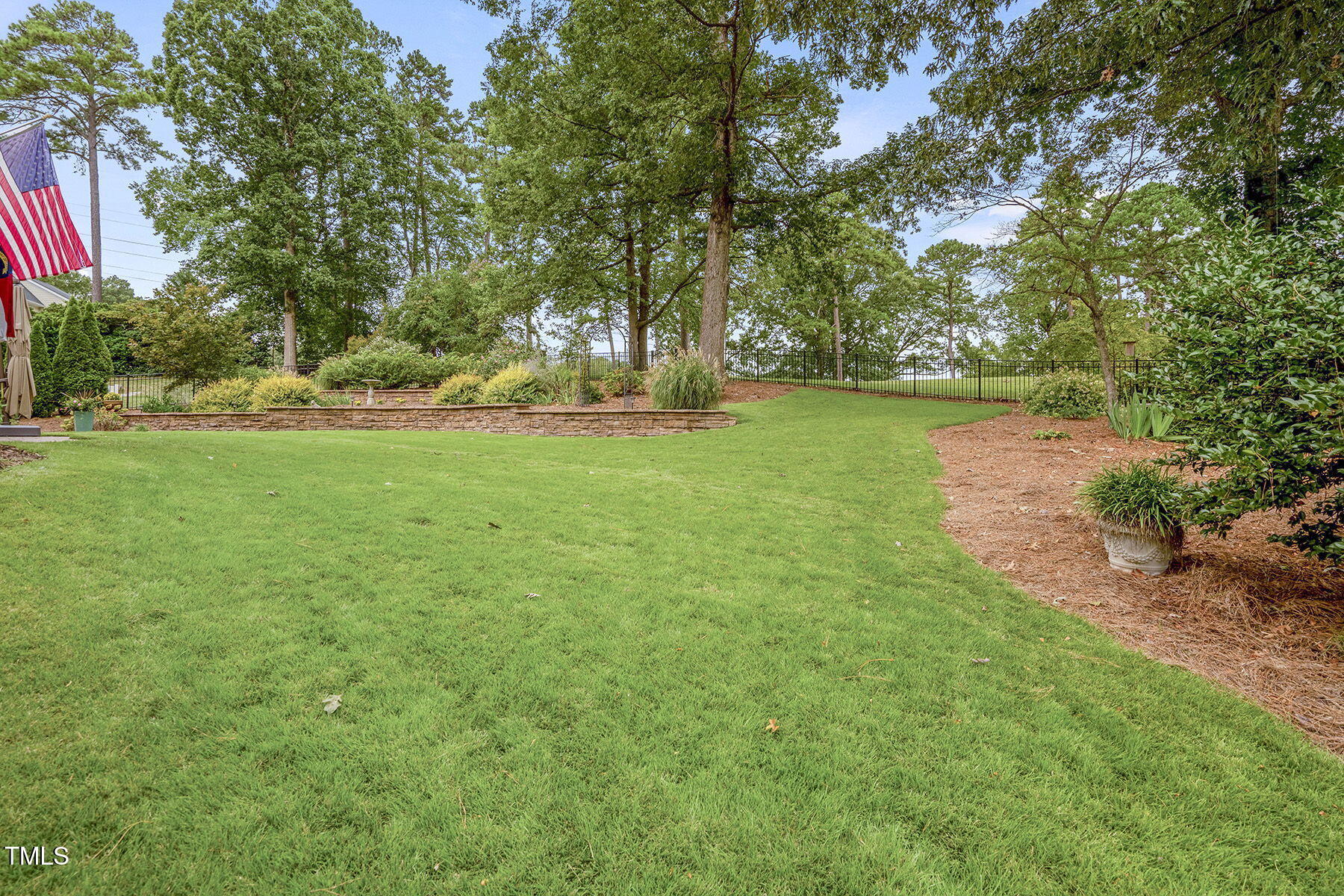 1605 Hunting Ridge Road Raleigh, NC 27615 - Photo 46 of 55 a view of outdoor space with deck and trees