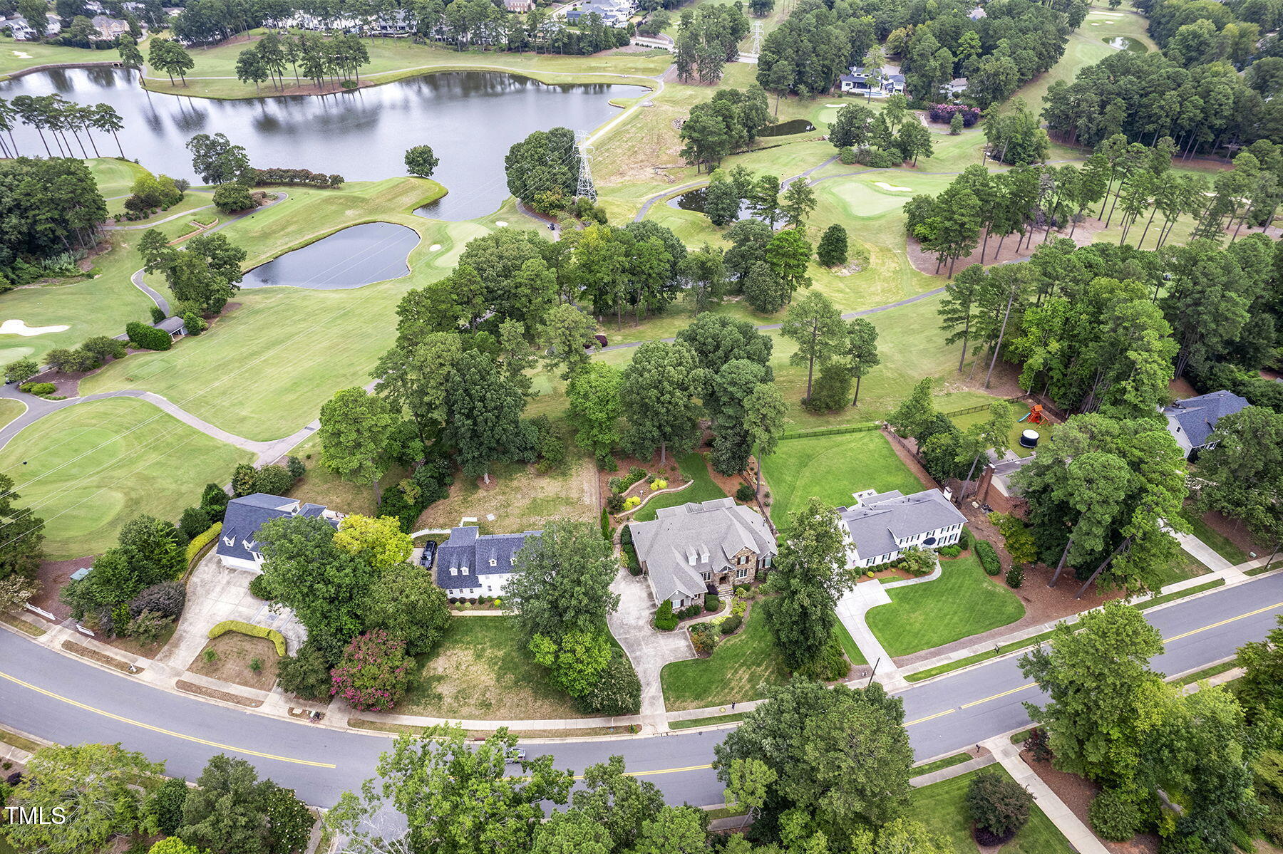 1605 Hunting Ridge Road Raleigh, NC 27615 - Photo 47 of 55 an aerial view of residential house with outdoor space and lake view