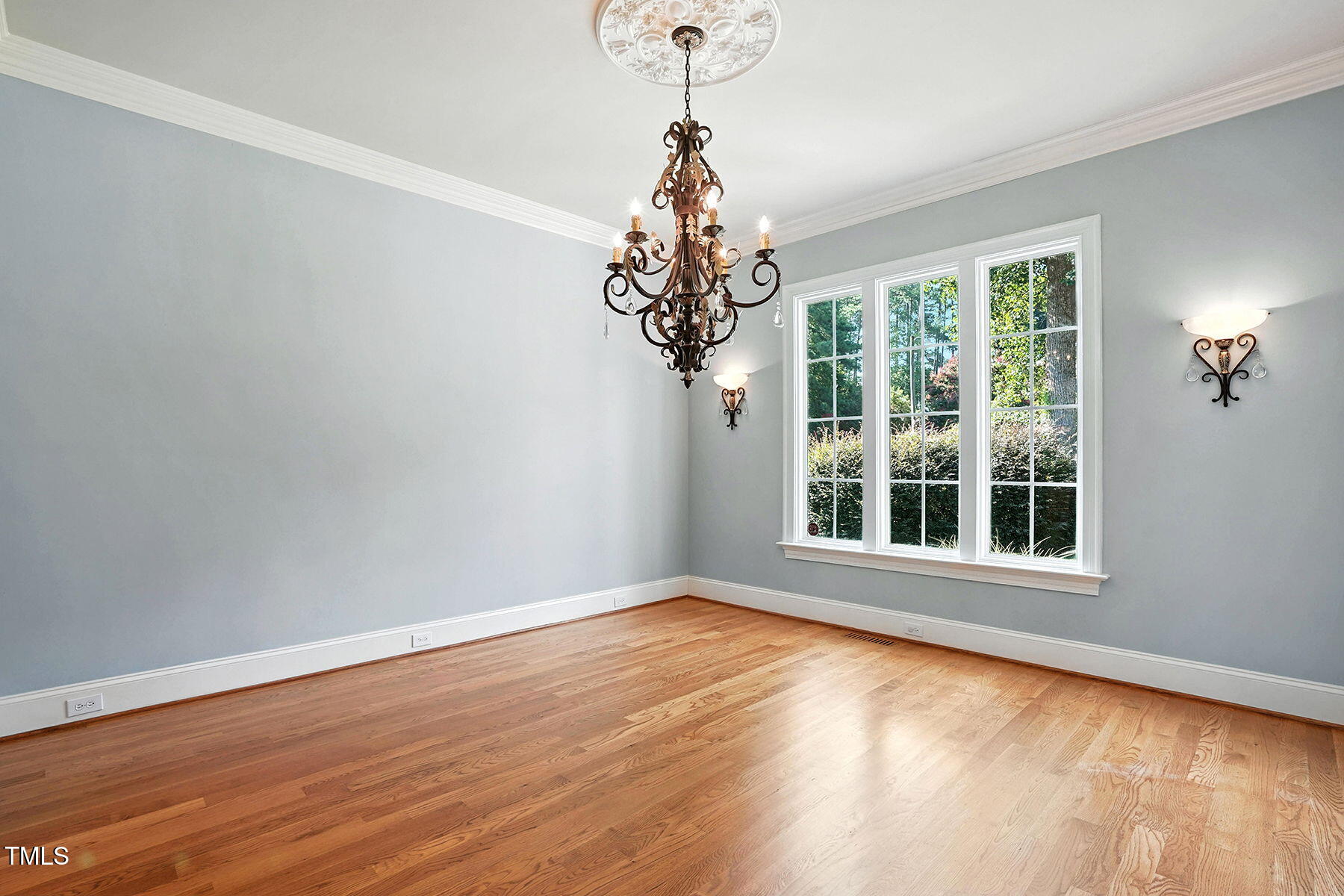 1605 Hunting Ridge Road Raleigh, NC 27615 - Photo 6 of 55 a window in an empty room
