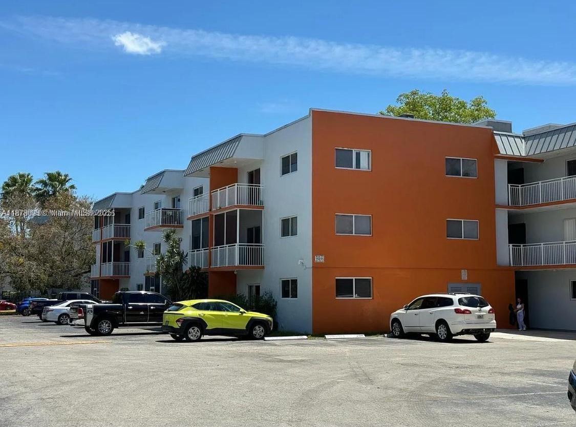 a car parked in front of a building