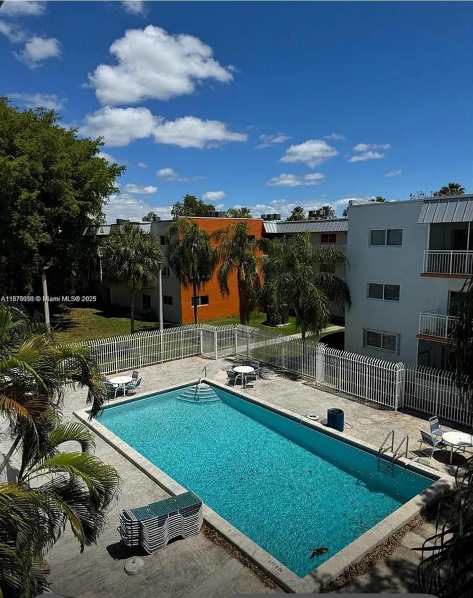 11301 Southwest 200th Street, Unit 306A Miami, FL 33157 - Photo 10 of 10 a view of a patio with swimming pool