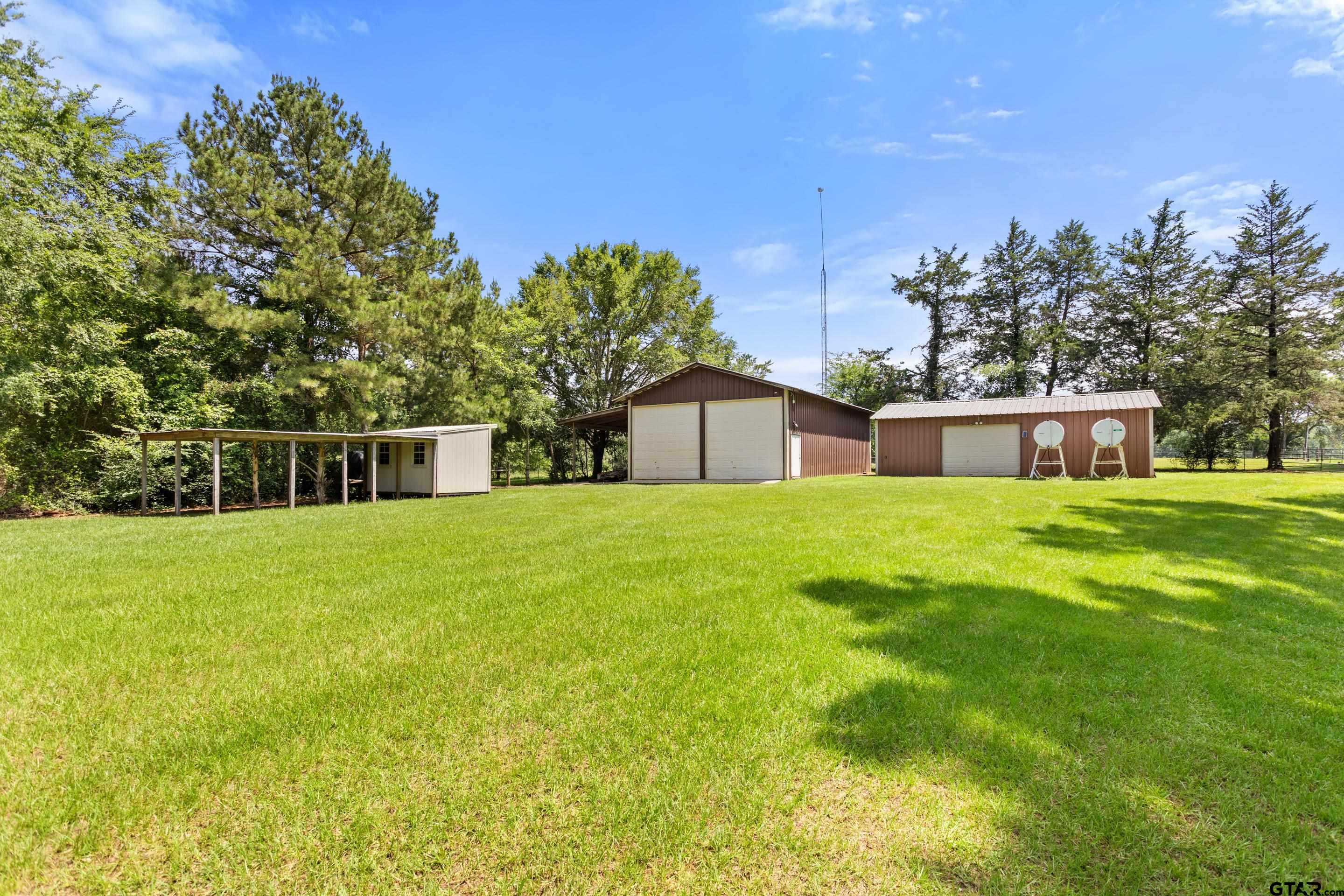 19678-c R 4125 C R 4125 Lindale, TX 75771 - Photo 11 of 48 a house view with a outdoor space