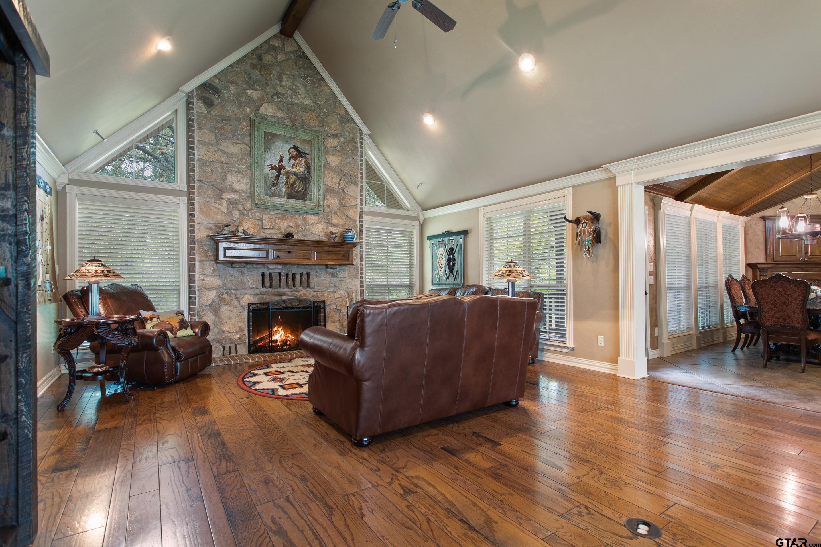 19678-c R 4125 C R 4125 Lindale, TX 75771 - Photo 25 of 48 a living room with furniture and a fireplace